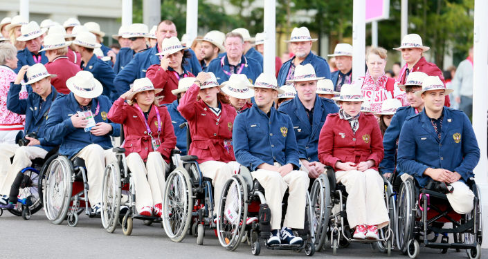 Krievijas paralimpiskā izlase Krievijas karoga pacelšanas ceremonijas laikā Paralimpiskajā ciematā Londonā. Foto no arhīva Krievijas paralimpiskā izlase Krievijas karoga pacelšanas ceremonijas laikā Paralimpiskajā ciematā Londonā. Foto no arhīva